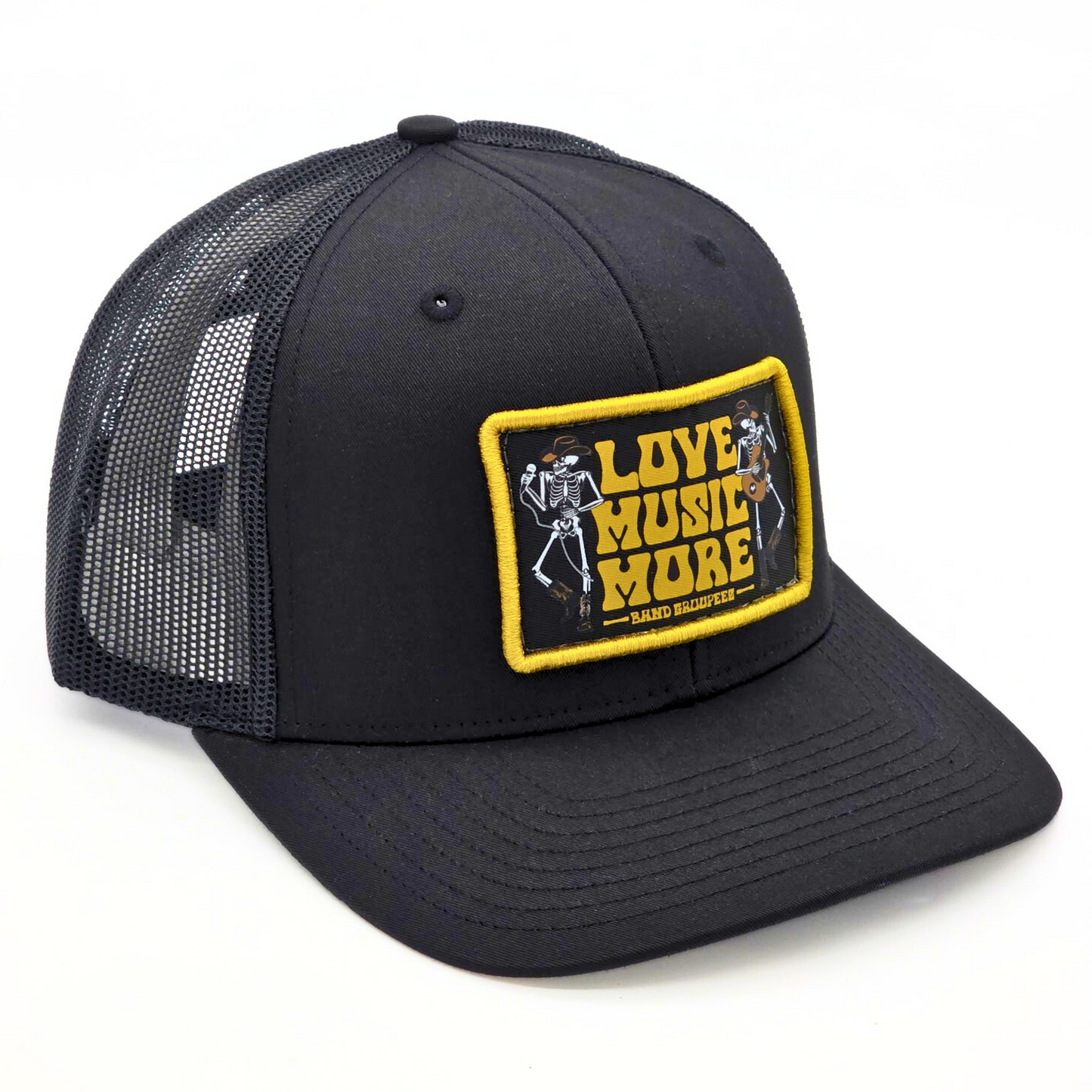 Black trucker hat with a yellow and white Love Music More patch on a white background