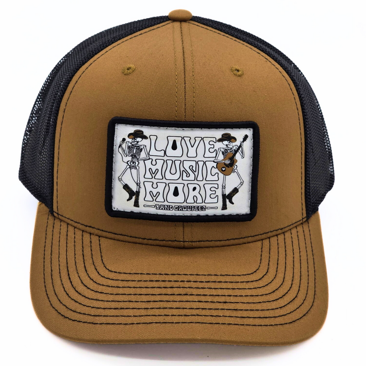 Brown trucker hat with a black mesh back and 'Love Music More' patch on a white background