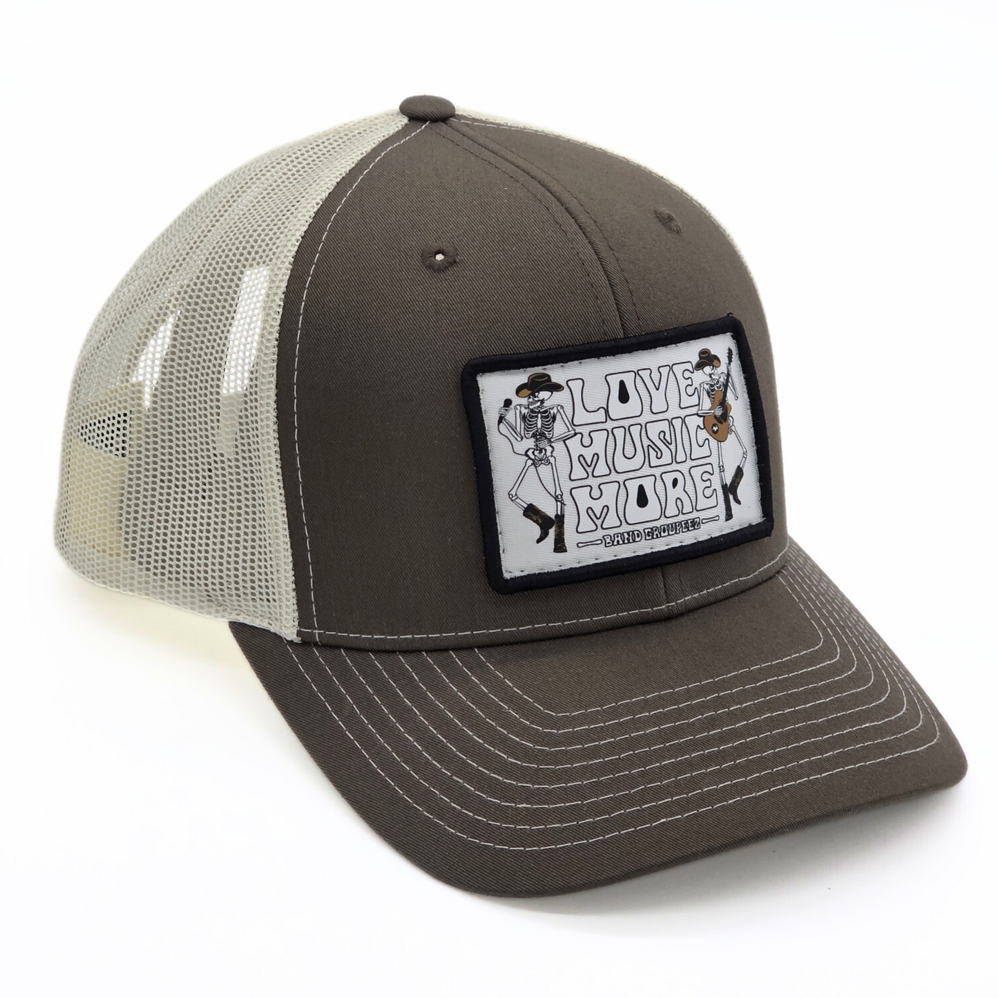 Gray and white trucker hat with a patch on a white background