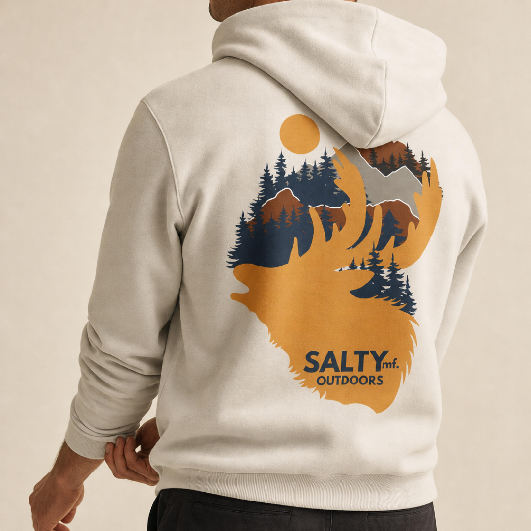 SALTYmf Elk Hunt Hoodie in Off-White, worn by a model, back view with the elk and mountain graphic